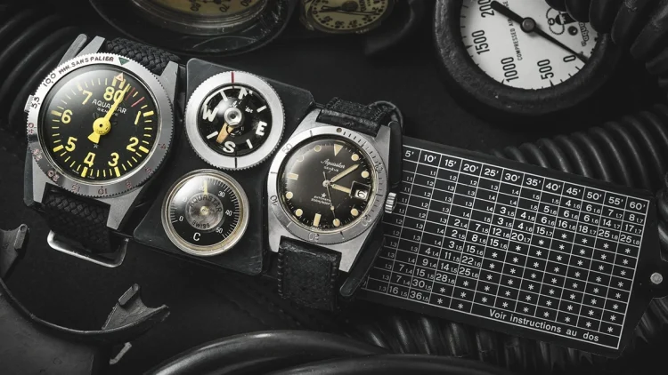 1960年代に発表されたAquastar Navigatorの実機。中央にコンパスと水深計、右側には当時のダイバーに不可欠だった物理的な減圧テーブルが装備されている。